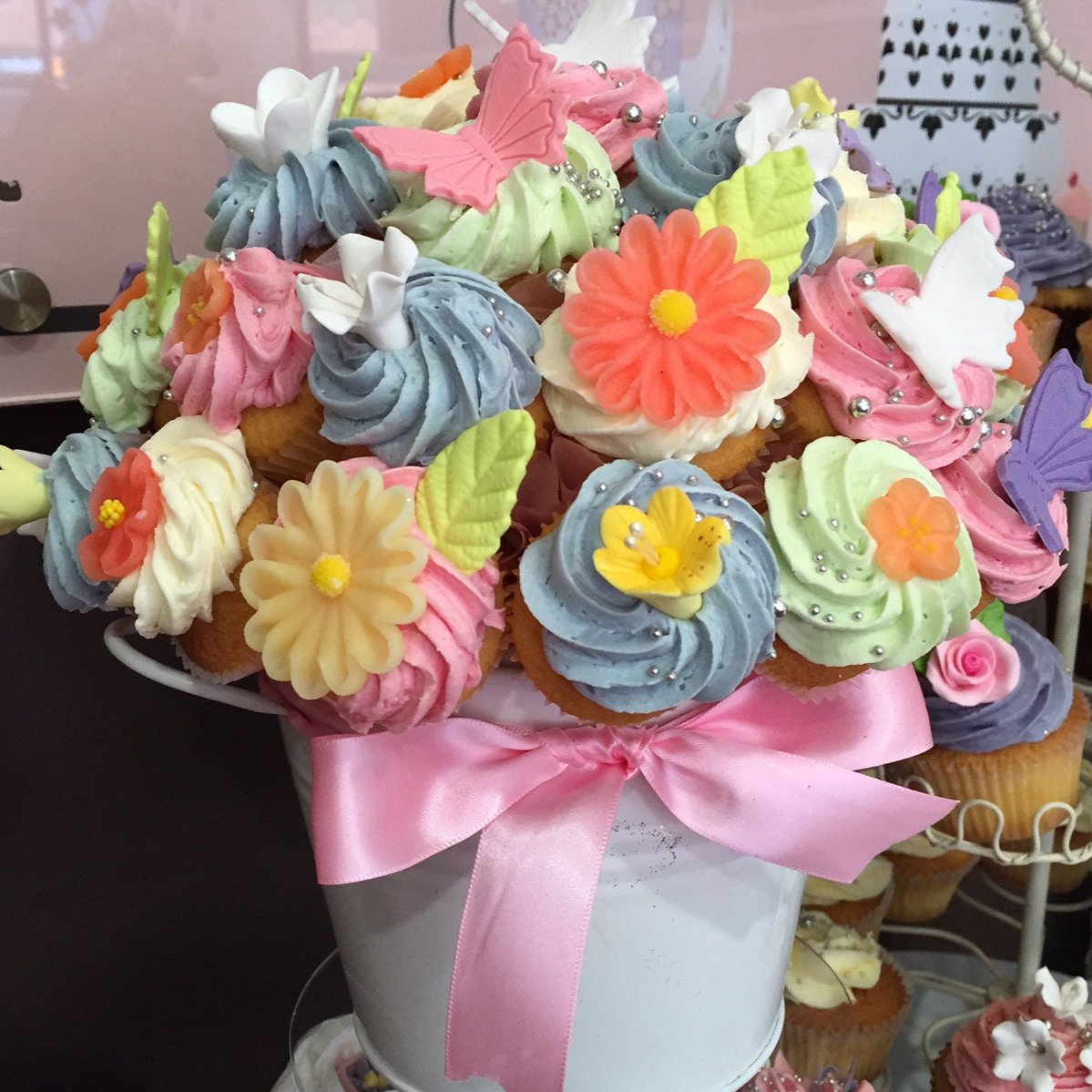 Butterfly and flower bouquet The Cupcake Factory