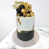 Black, White and Gold Celebration Cake
