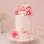 Decorative cake with pink flamingo and flower design on a light pink background