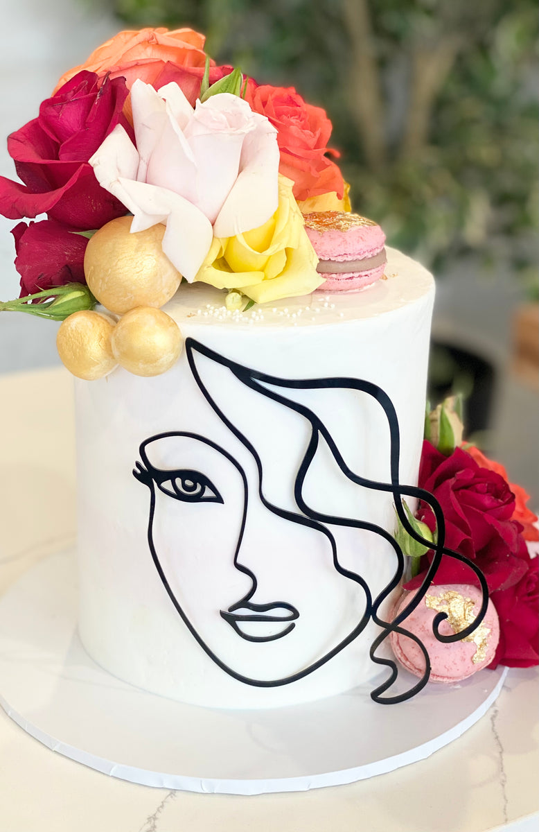 Floral Face Cake – The Cupcake Factory