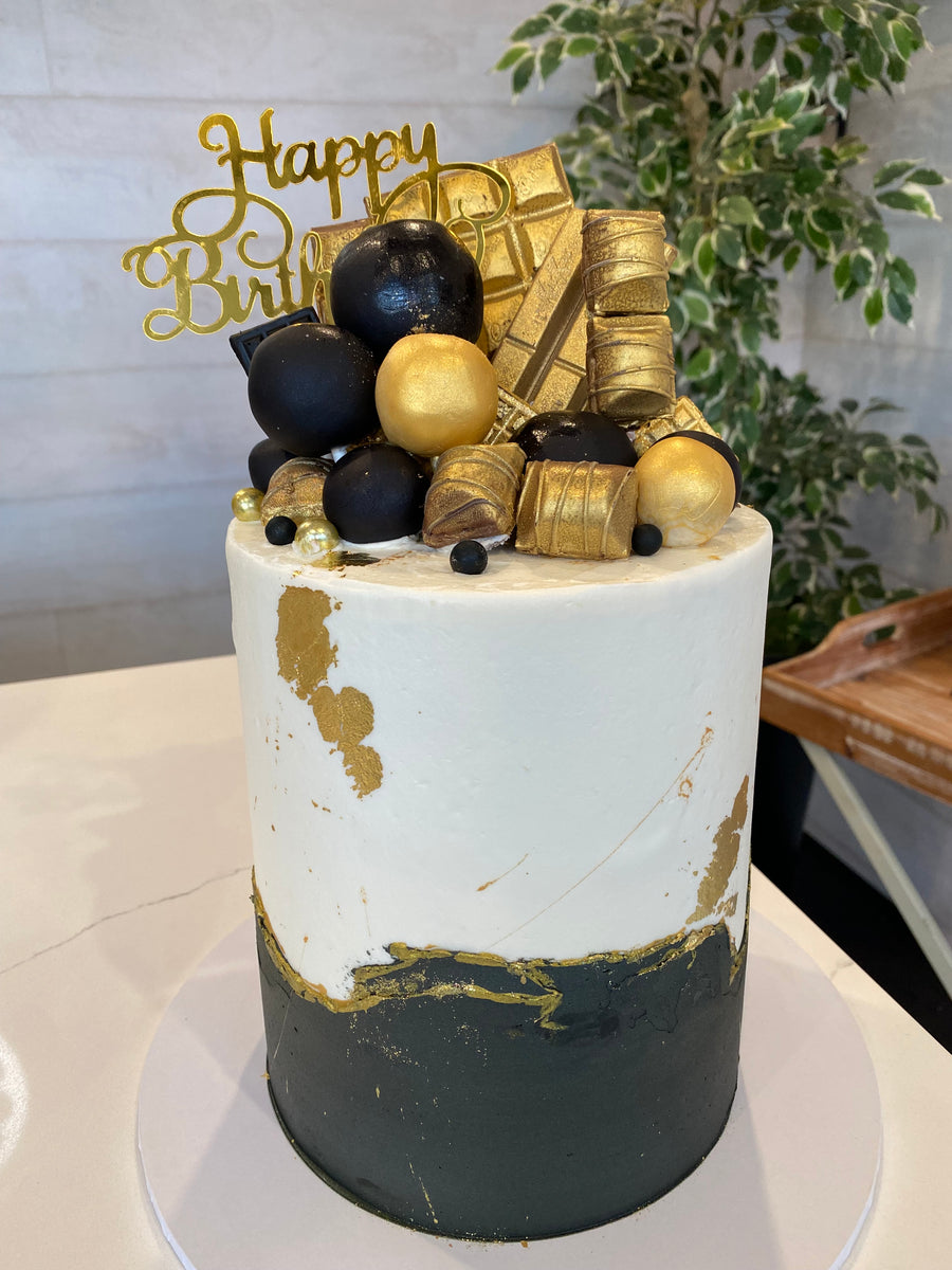 Black white and gold Celebration Cake – The Cupcake Factory