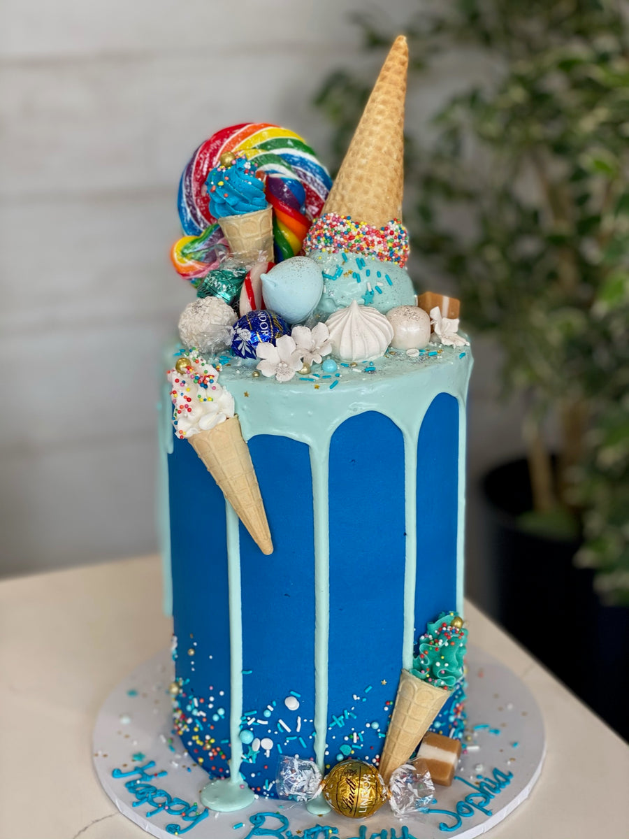 Ice cream cone drip cake – The Cupcake Factory