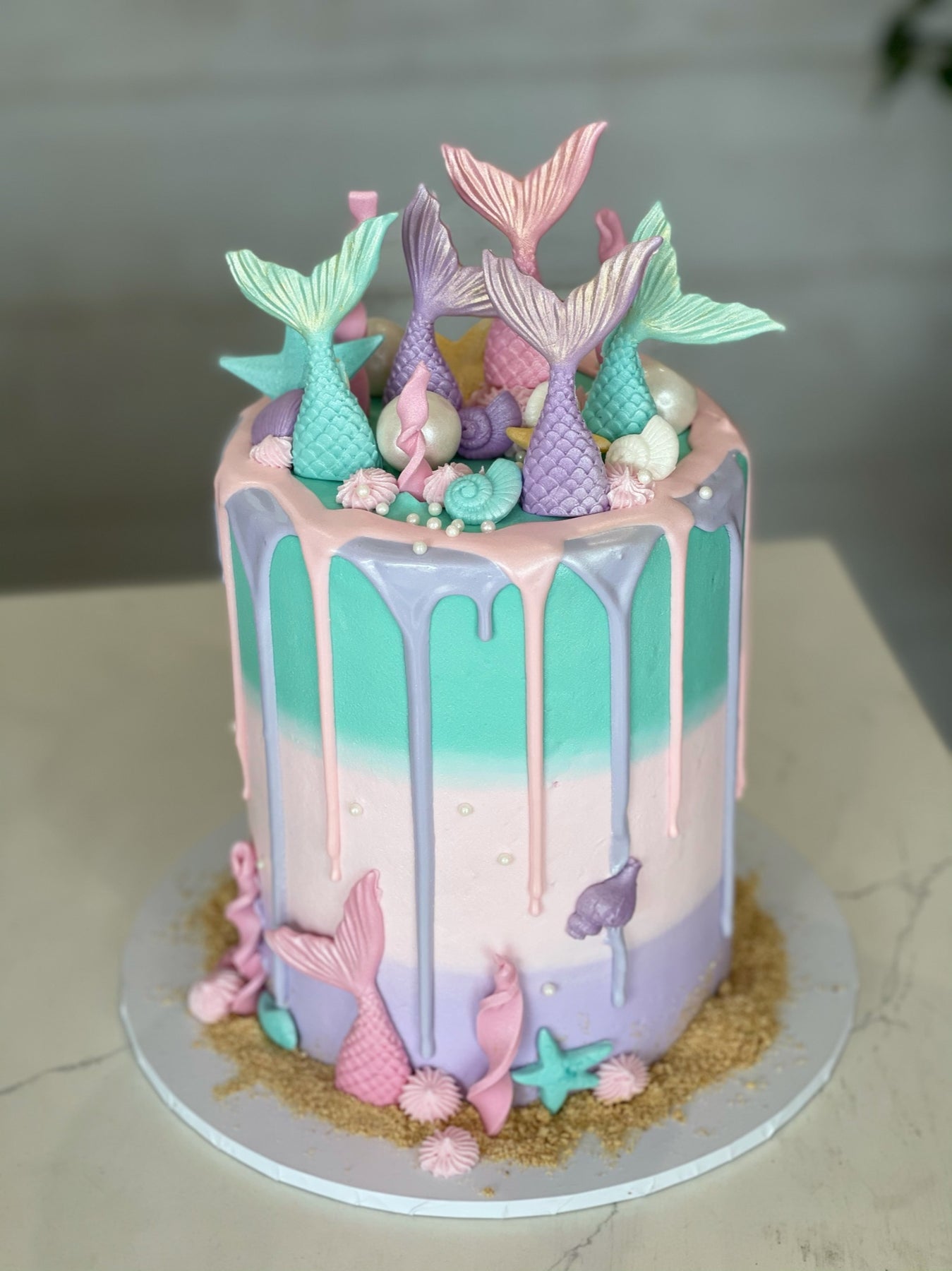 Mermaid tail drip cake – The Cupcake Factory